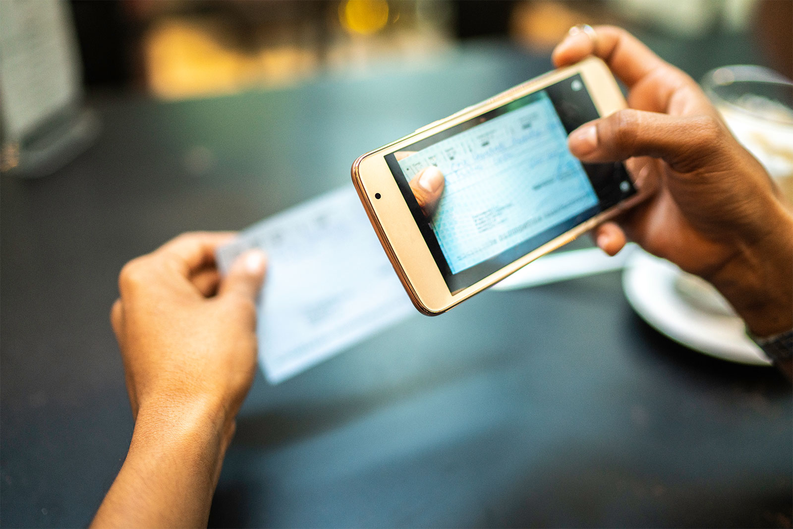 Picture of a phone being used for mobile banking